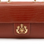 BOLSA BAGUETE ANNE PEQUENA COURO LIZARD JASPE OURO
