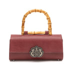 BOLSA TOP HANDLE EAST WEST PEQUENA COURO LIZARD PINHAO
