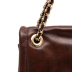 BOLSA FLAP DAHLIA CROSBY COURO PINHÃO OURO