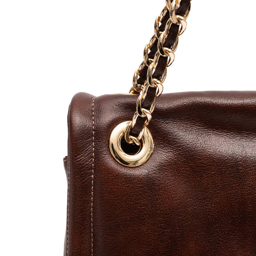 BOLSA FLAP DAHLIA CROSBY COURO PINHÃO OURO
